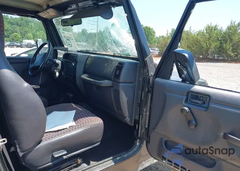 1999 Jeep Wrangler Sport from USA, damaged, VIN 1J4FY19S9XP423684